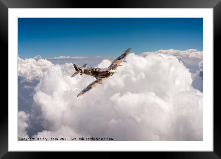 Spitfire above clouds Framed Mounted Print by Gary Eason