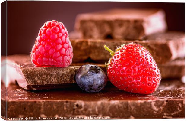 Berries on chocolate (reload) Canvas Print by Silvio Schoisswohl