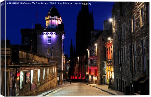 Edinburgh Camera Obscura and Royal Mile at night Canvas Print by Angus McComiskey