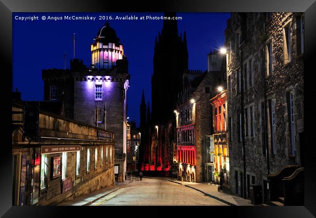 Edinburgh Camera Obscura and Royal Mile at night Framed Print by Angus McComiskey