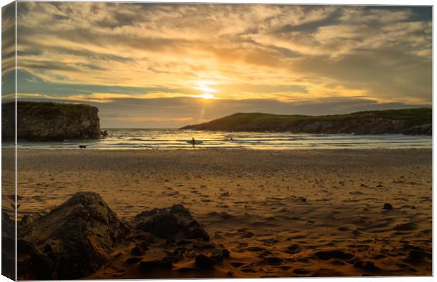 Anglesey sunset at Cable bay Canvas Print by Rob Lester