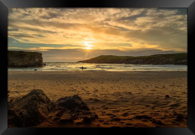 Anglesey sunset at Cable bay Framed Print by Rob Lester