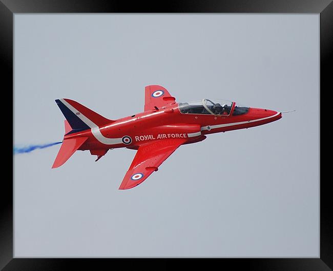 Red Arrow close up Framed Print by Dave Lloyd