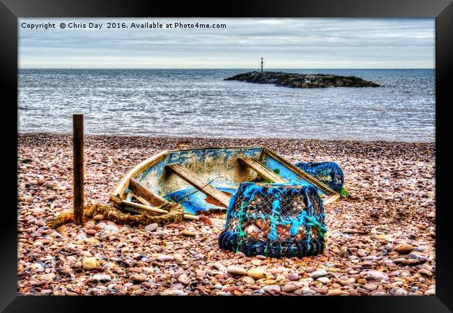 Abandoned boat and Lobster Pot Framed Print by Chris Day