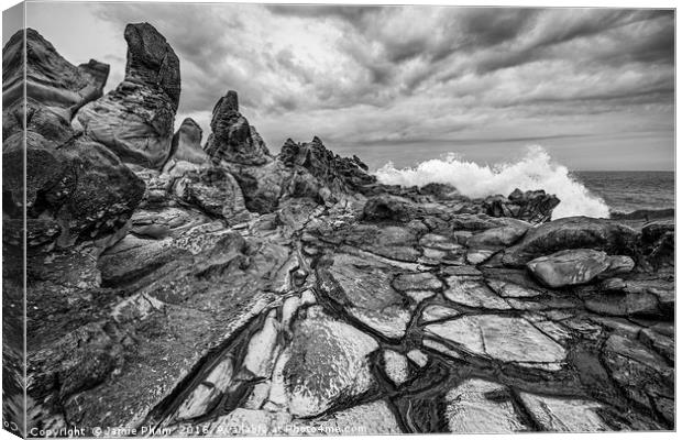 Dramatic lava rock formation called the Dragon's T Canvas Print by Jamie Pham