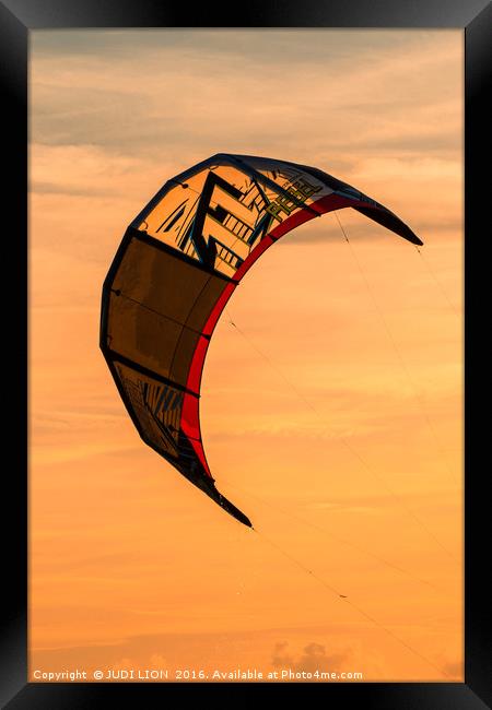 Kite surfing in the sunset Framed Print by JUDI LION