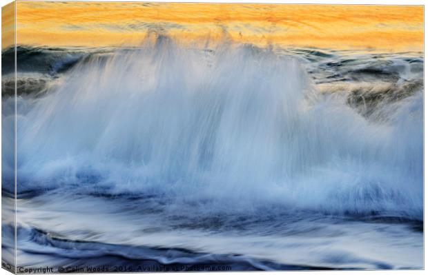 Breaking wave at dawn Canvas Print by Colin Woods