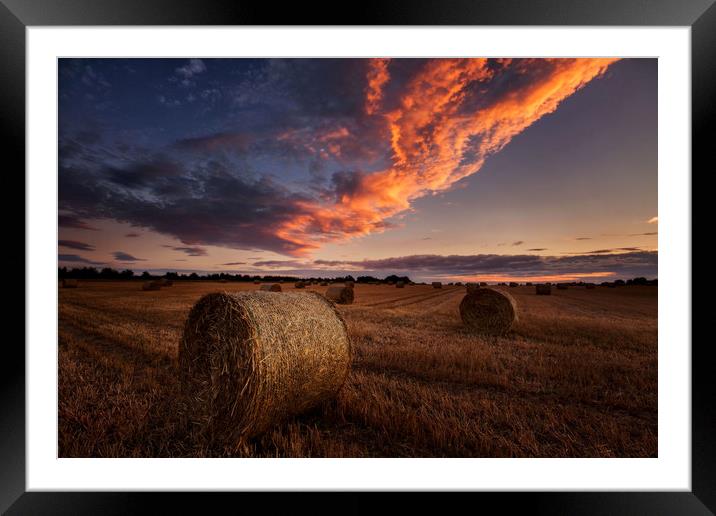 Straw bales sunset Framed Mounted Print by Paul Bullen