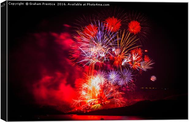 Spectacular fireworks over Santorini Canvas Print by Graham Prentice