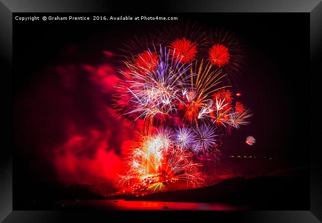 Spectacular fireworks over Santorini Framed Print by Graham Prentice