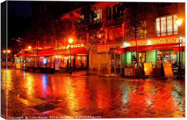 A Rainy Night in Paris Canvas Print by Colin Woods