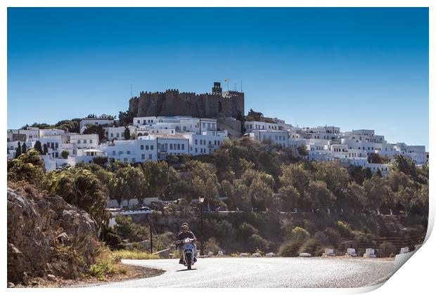 PATMOS, GREECE - SEPTEMBER 25, 2016: A moped drive Print by George Cairns