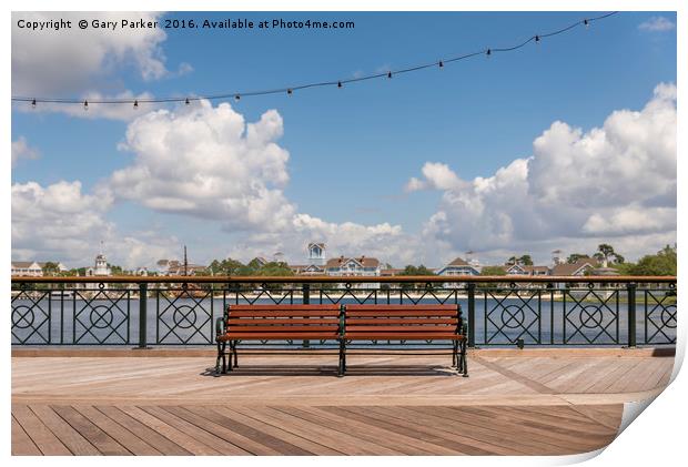 Single public bench on a boardwalk Print by Gary Parker
