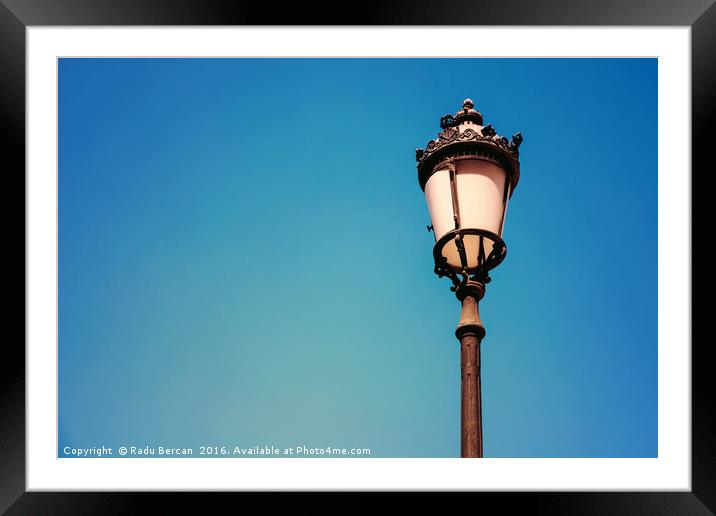 Vintage Street Lamp On Blue Sky Framed Mounted Print by Radu Bercan