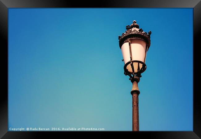 Vintage Street Lamp On Blue Sky Framed Print by Radu Bercan