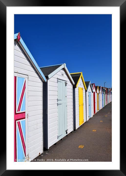 Beach huts as far as the eye can see Framed Mounted Print by Eve Denby