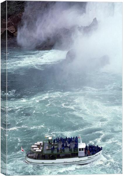 Niagara Falls, tourist boat, Ontario, Canada Canvas Print by Alfredo Bustos