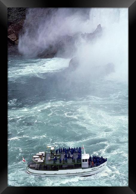 Niagara Falls, tourist boat, Ontario, Canada Framed Print by Alfredo Bustos