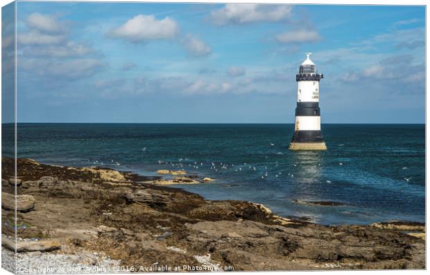 Penmon or Trwyn Du Lighthouse off the Anglesey Coa Canvas Print by Nick Jenkins