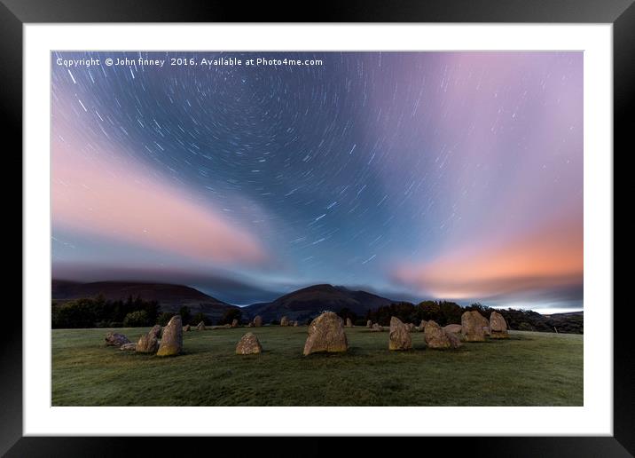 Castlerigg stone circle Star trails, Lake District Framed Mounted Print by John Finney