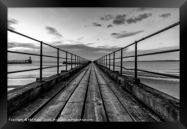 Down the pier Framed Print by Phil Reay