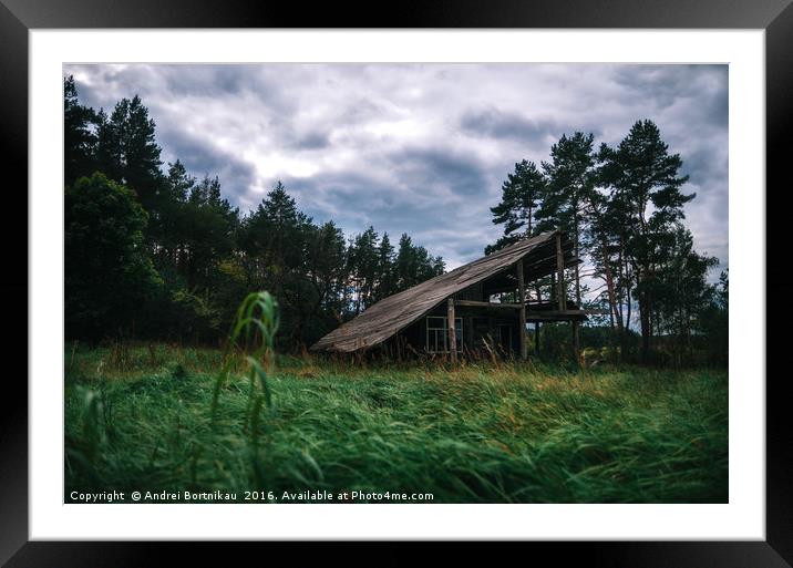 Old wooden abandoned house in the forest at twilig Framed Mounted Print by Andrei Bortnikau