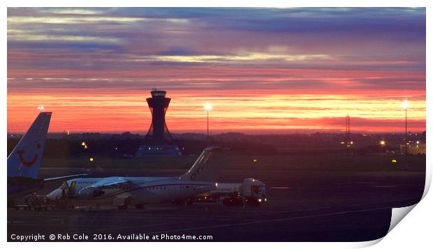 A fiery dawn at Newcastle Airport Print by Rob Cole