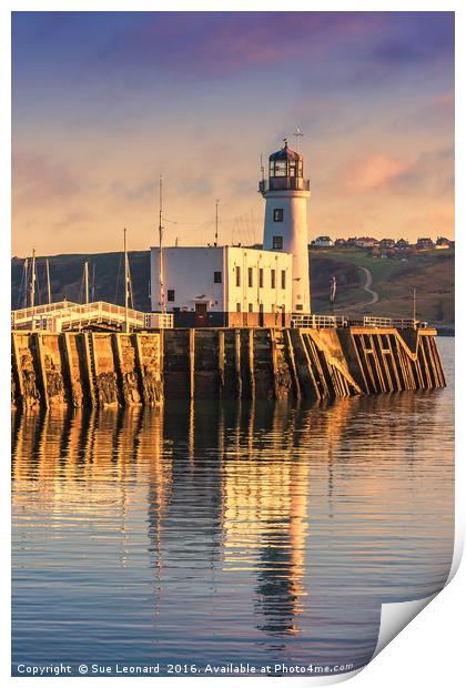 Sunset over Scarborough Lighthouse Print by Sue Leonard