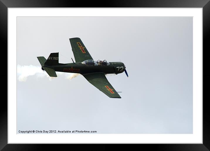 Nanchang CJ6 fighter in flight Framed Mounted Print by Chris Day