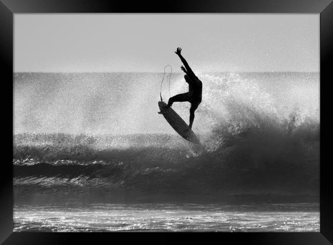 Silhouetted Surfer at Dawn Framed Print by peter tachauer