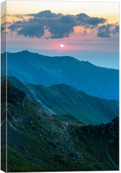 Mountain range at sunset Canvas Print by Ragnar Lothbrok