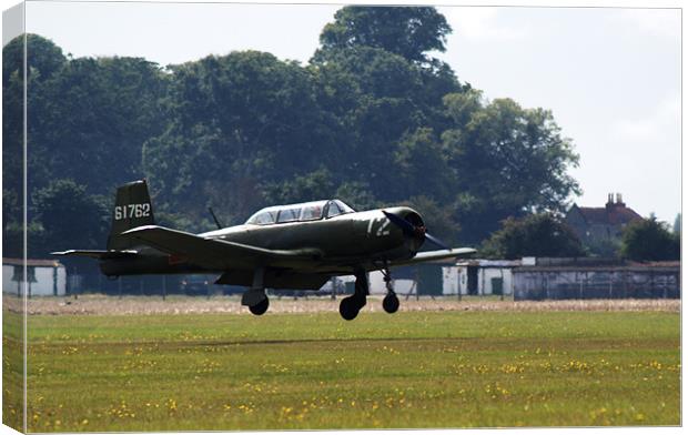 Nanchang CJ6 fighter coming in to land Canvas Print by Chris Day