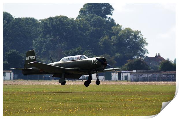 Nanchang CJ6 fighter coming in to land Print by Chris Day