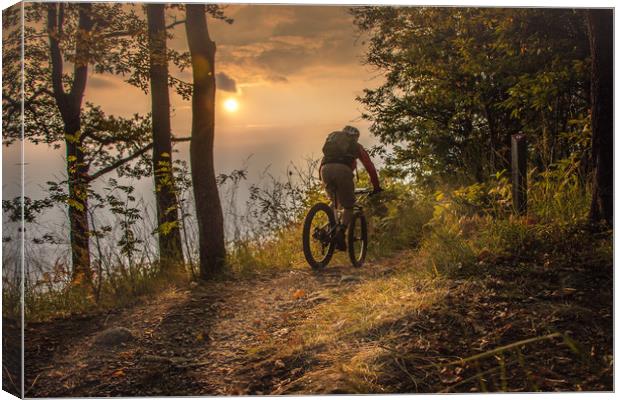 Mountain biking till the sunset Canvas Print by Fabrizio Malisan