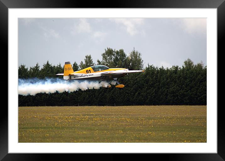 Extra 300 aerobatic plane taking off Framed Mounted Print by Chris Day