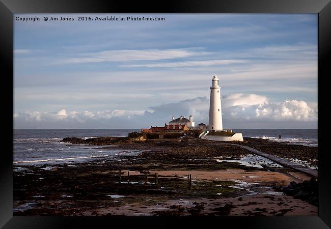 St Mary's Island and lighthouse Framed Print by Jim Jones