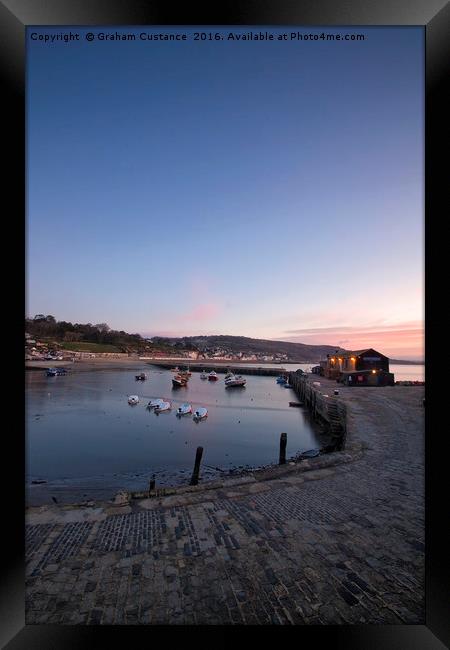 Lyme Regis Sunrise Framed Print by Graham Custance