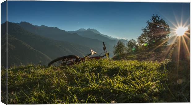 Evening comes, bike's tired ..let's enjoy the suns Canvas Print by Fabrizio Malisan