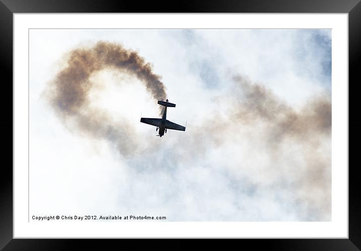 Extra 300 aerobatic plane and smoke trail Framed Mounted Print by Chris Day