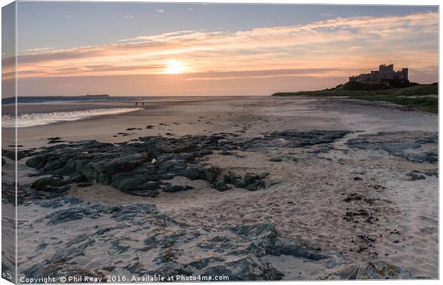 Bamburgh Castle at sunrise Canvas Print by Phil Reay