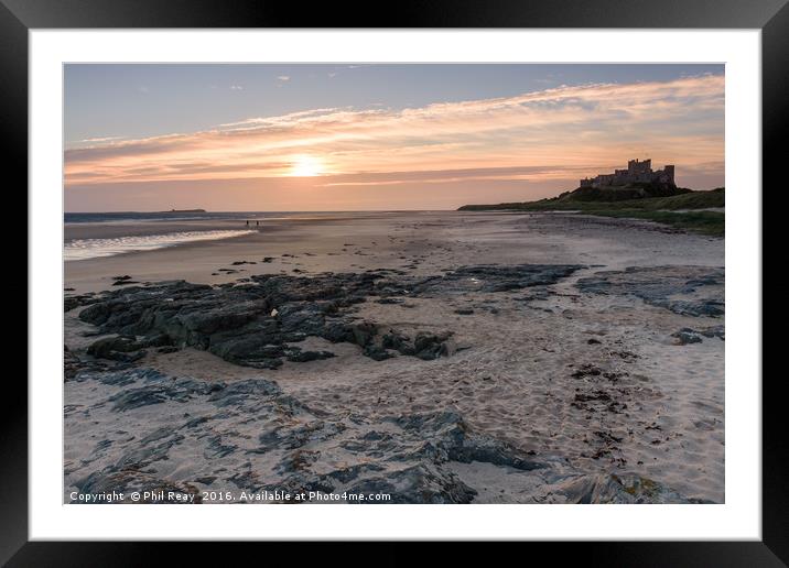 Bamburgh Castle at sunrise Framed Mounted Print by Phil Reay