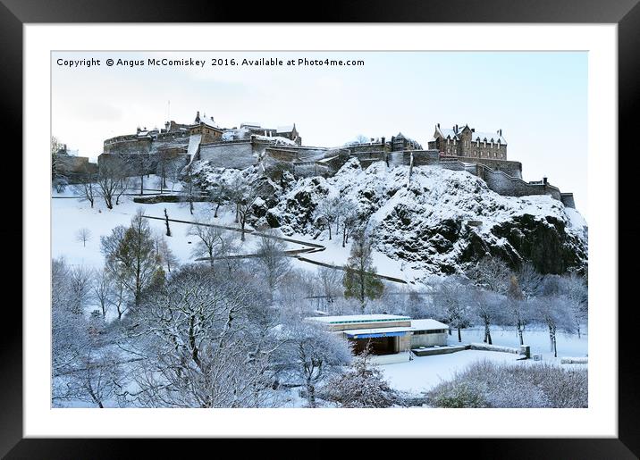 Edinburgh Castle and Ross Bandstand in snow Framed Mounted Print by Angus McComiskey