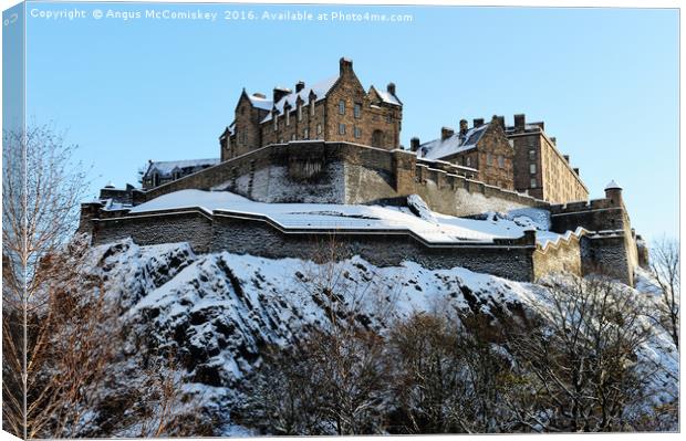 Edinburgh Castle in snow Canvas Print by Angus McComiskey