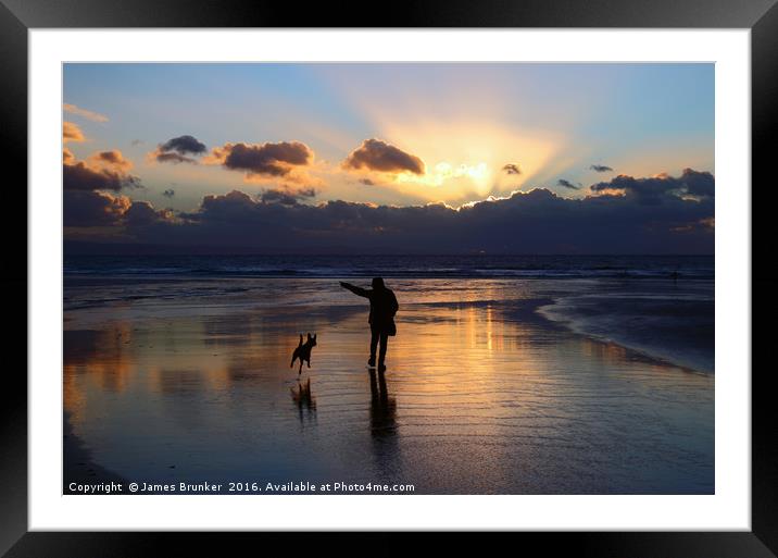 Walking the Dog at Sunset on Dunraven Bay Beach Framed Mounted Print by James Brunker