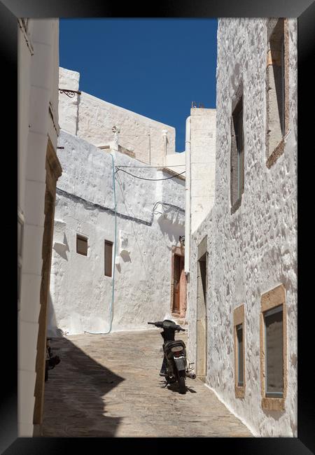 White buildings and blue sky Framed Print by George Cairns