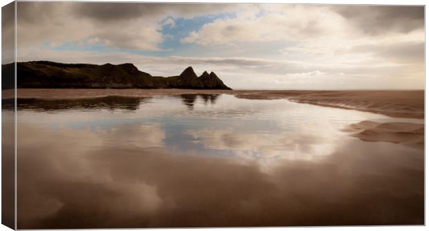 Reflections of Three Cliffs Bay Canvas Print by Leighton Collins