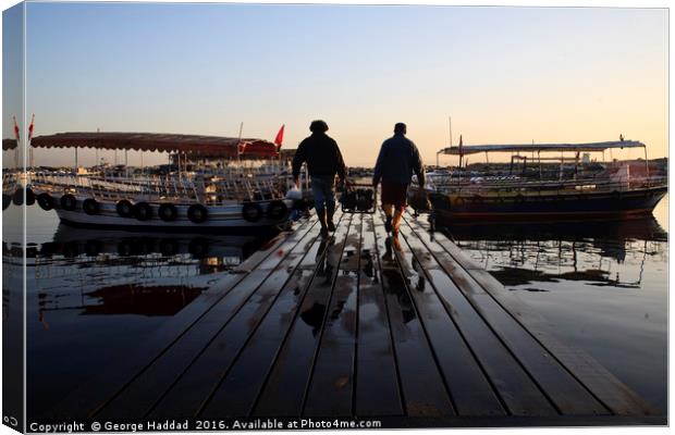 Loading the Boat. Canvas Print by George Haddad