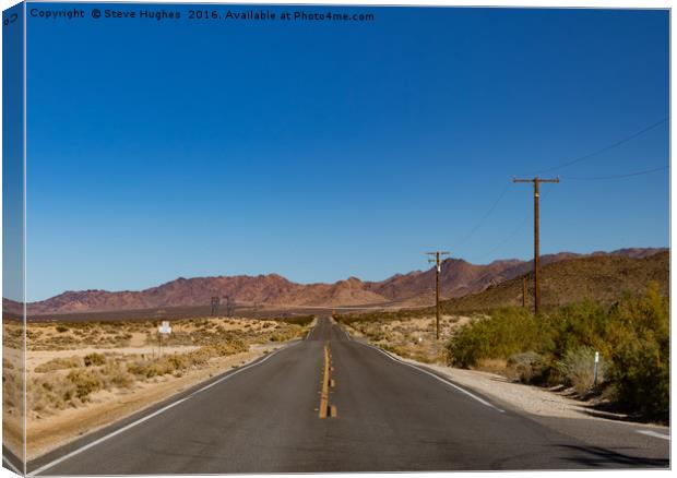 Road through the Desert Canvas Print by Steve Hughes