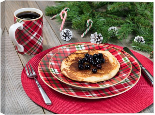 Pancake breakfast for Christmas day with evergreen Canvas Print by Thomas Baker