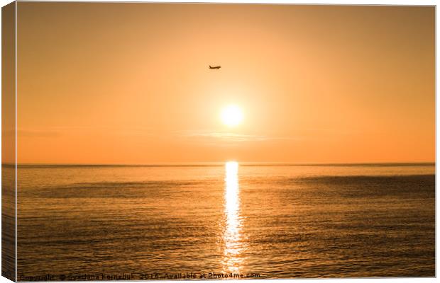 Flight Over The Sea At Sunset  Canvas Print by Svetlana Korneliuk